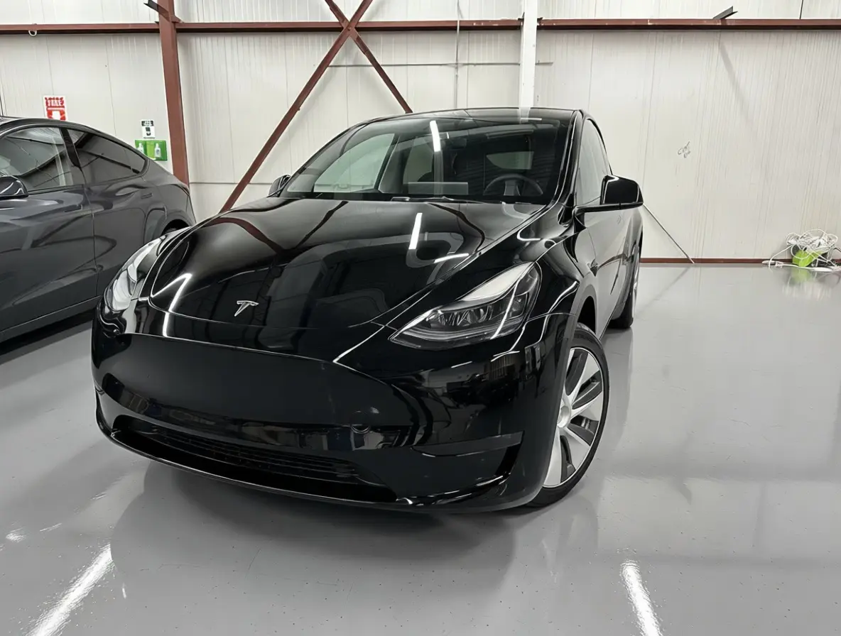 Certified, local vehicle, non-smoker 2023 Tesla Model Y Standard Range in Black with Black interior – front exterior view Certified, local vehicle, non-smoker 2023 Tesla Model Y Standard Range in Black with Black interior – front exterior view