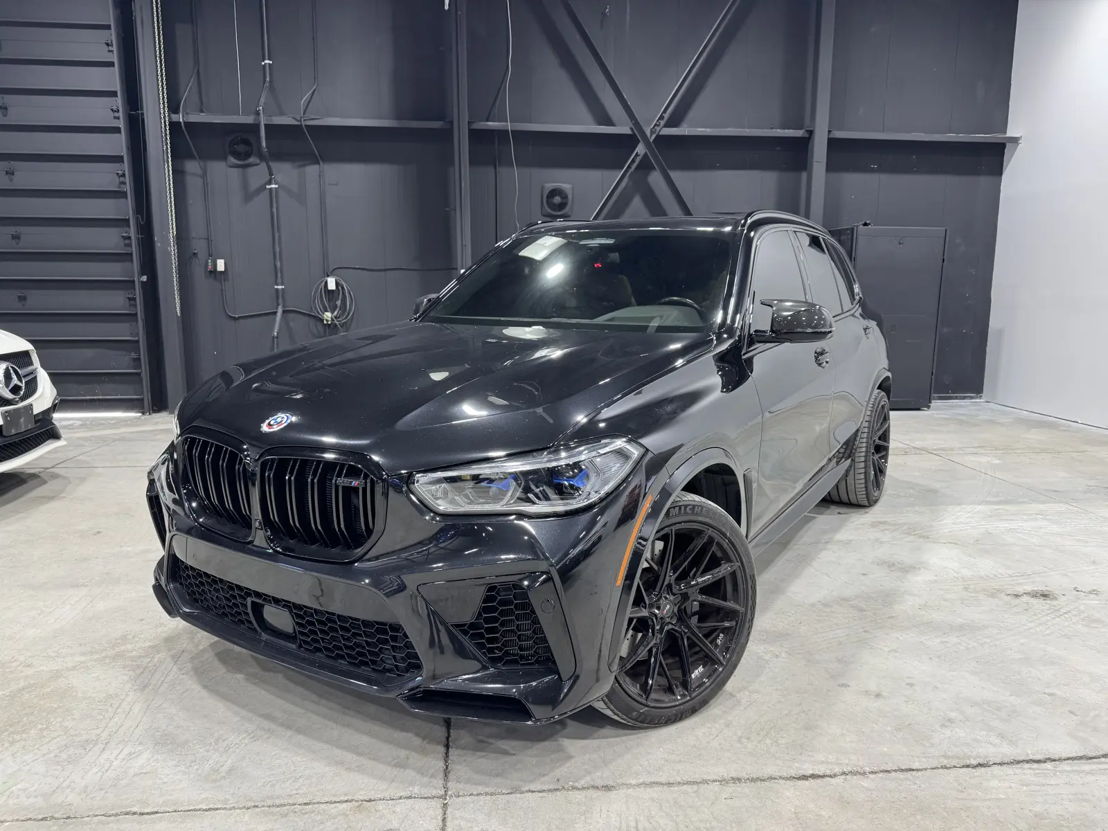 Certified, one-owner, garage kept, local vehicle, non-smoker 2022 BMW X5 M Competition in Black with Brown interior